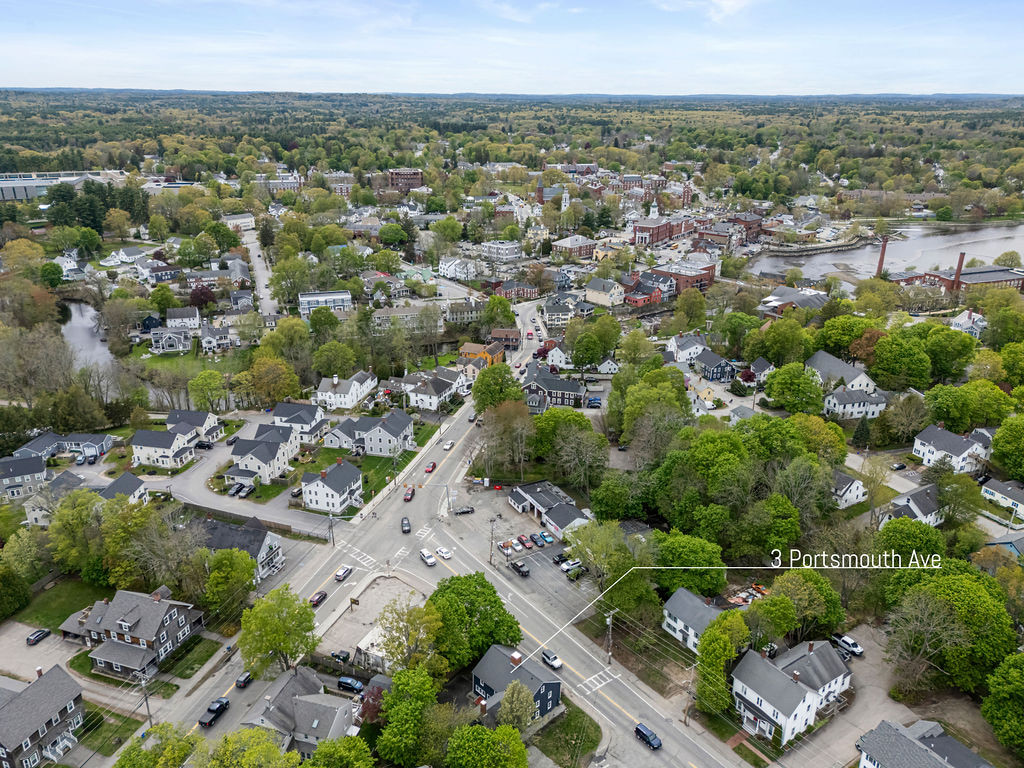 Aerial view toward the town center with a callout identifying 3 Portsmouth Ave near the intersection.